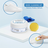 Shoe cleaning kit with paste, sponge, and white sneaker on a light blue background